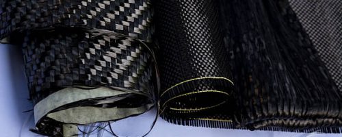 Black carbon fiber composite product material background