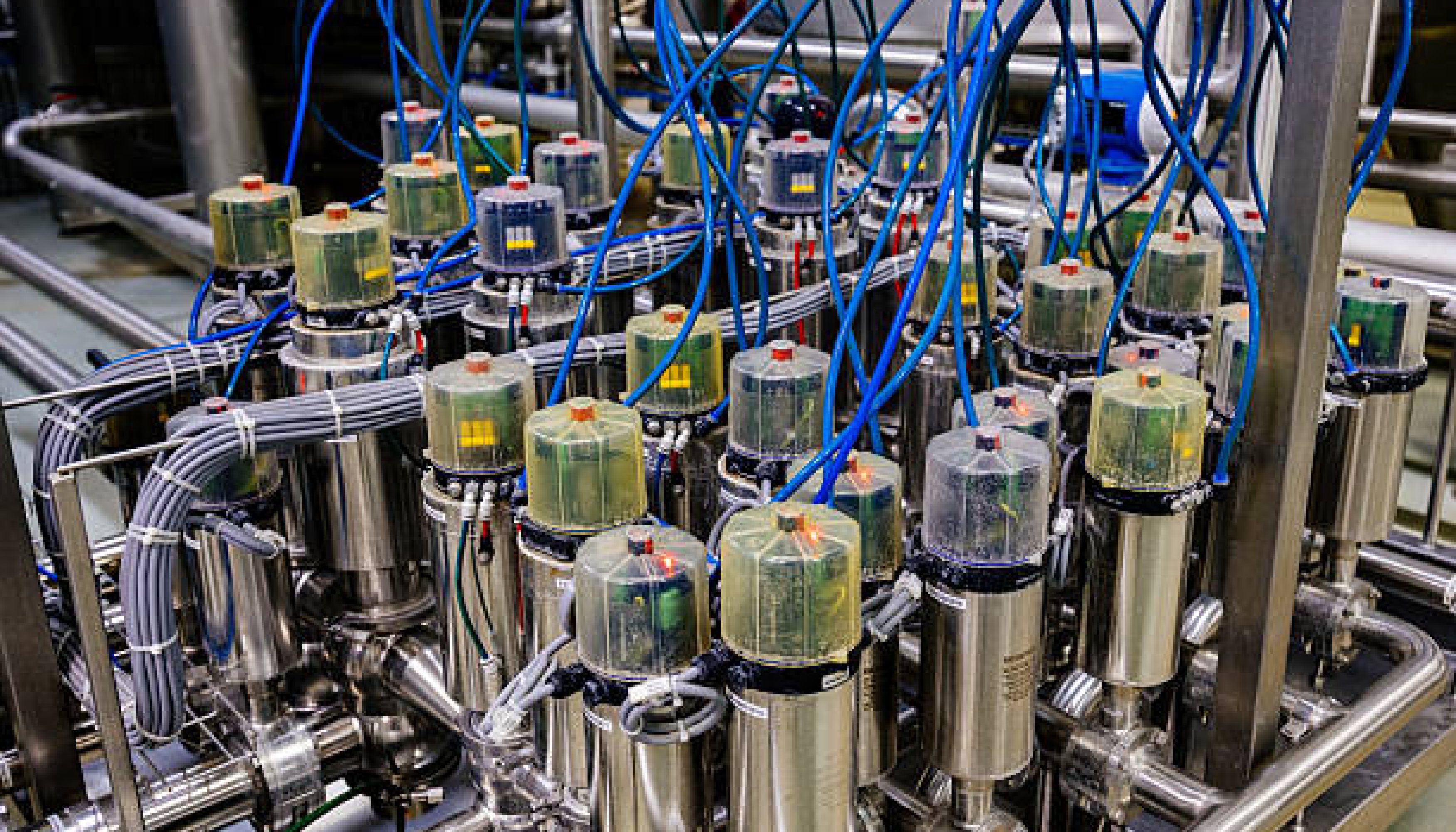 Matrix of mixproof separation valves in modern food or chemical factory.